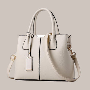 Lady Metal Pendant Pebbled Leather Handbag